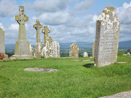 Rural cemetery in Ireland with fields and mountains behindのeditorial素材