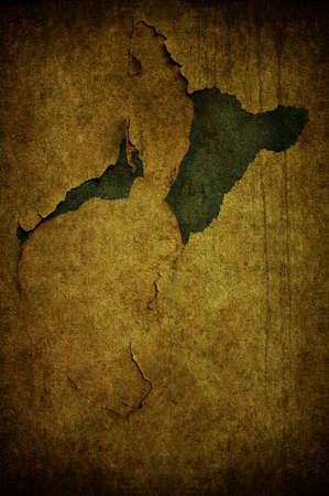 A cracked light yellow grunge concrete backgroundの写真素材