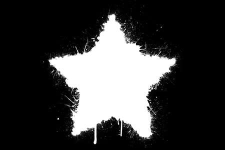 A white splatter star isolated on a black backgroundの写真素材