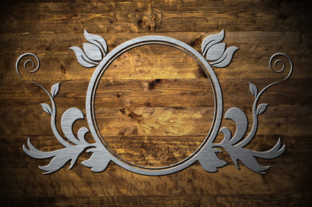 A metal frame on a wooden backgroundの写真素材