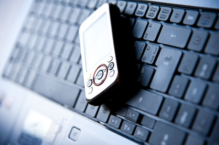 Cellular on a keyboard of a black laptop