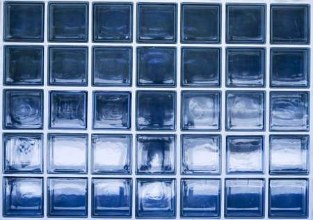 A glass blue texture made of many little squareの写真素材