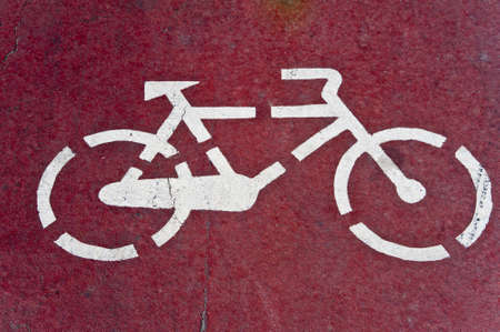 White painted sign for bikes on asphaltの写真素材