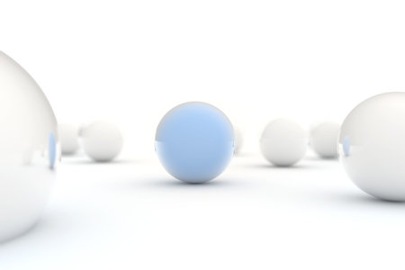 A blue ball with other white aroundの写真素材