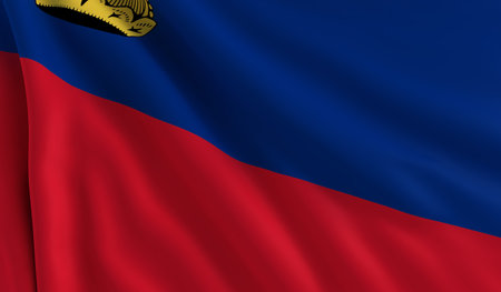 A flag of Liechtenstein in the windの写真素材