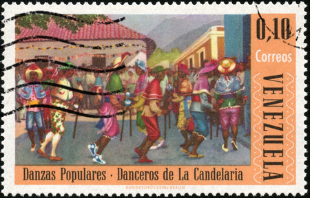 CIRCA 1966  A stamp printed in Venezuela showing traditional venezuelan dance, circa 1966の写真素材
