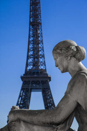 Statue of woman at the Trocadero with Tour Eiffelの写真素材