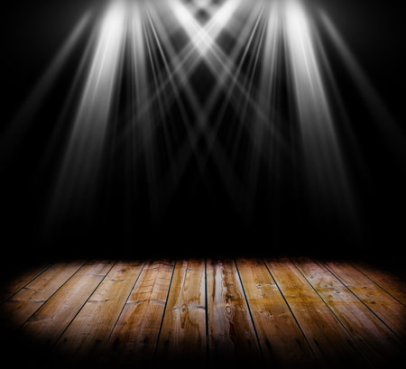Two spot light on a wooden floor and a black backgroundの写真素材
