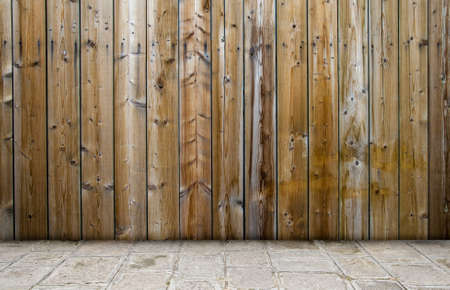 Grunge old room with wooden planks and brickの写真素材
