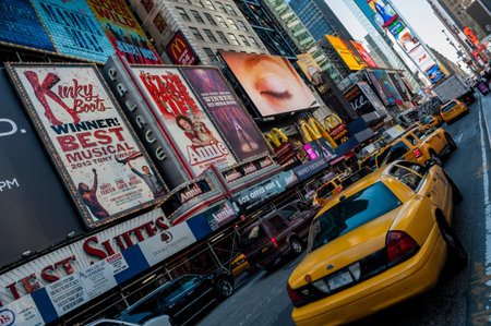 NEW YORK CITY - SEPTEMBER 18: Times Square, featured with Broadway Theaters and animated LED signs,...