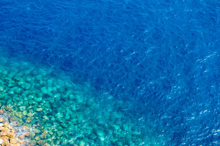 Blue sea surface with waves like textureの写真素材