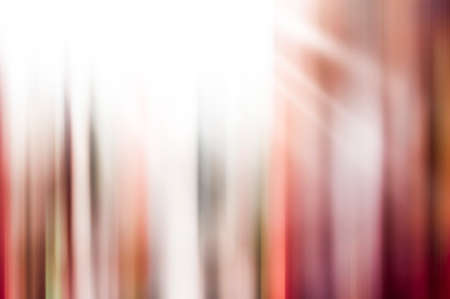 Abstract background in red tones with light for your designの写真素材