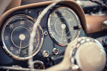 Close up on a dashboard of a vintage carの写真素材