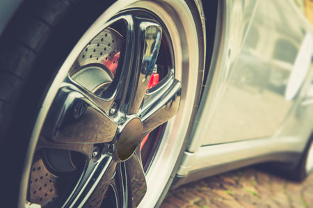 Close up of a modern sport wheel in vintage effectの写真素材