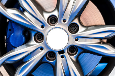 Close up of a modern sport wheel with blue brake