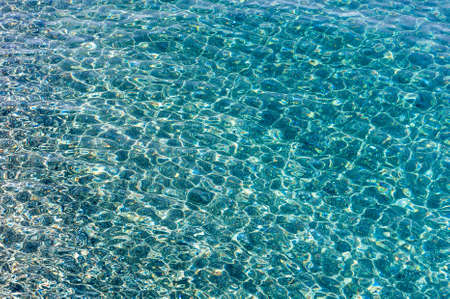 Beautiful blue sea texture with waves for your backgroundの写真素材