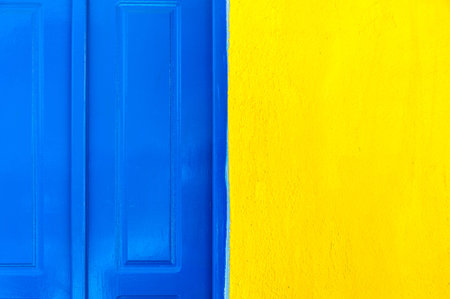 Blue door and yellow wall texture for your background