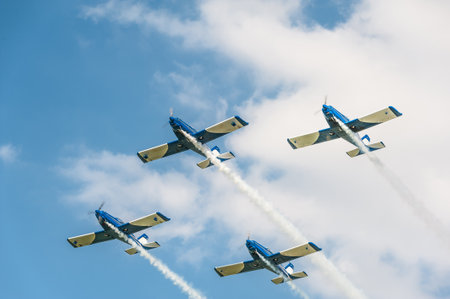 Four airplanes on airshow in formationのeditorial素材