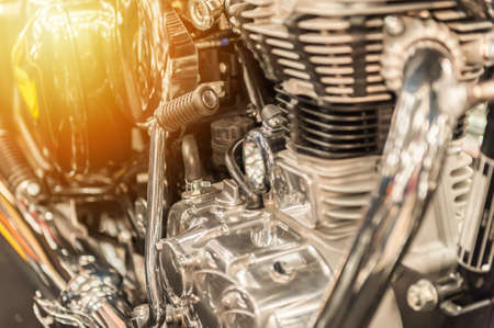 Engine of a powerful motorbike in the sunsetの写真素材