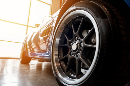 Back of a generic blue sport car in sunlight
