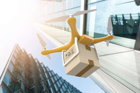 Drone with a delivery box package in a modern city: 3D renderingの写真素材