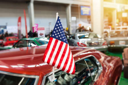 USA flag in a showroom with sunlightの写真素材