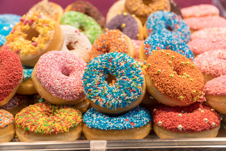 Many colorful assorted donuts