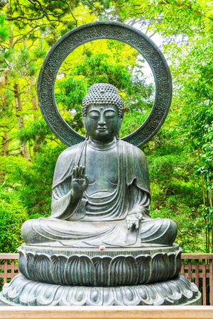 Seated Bronze Buddha on Lotus at San Francisco Japanese Gardenのeditorial素材