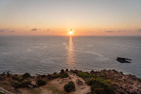 The beautiful italian island Sardinia in mediterranean sea at sunset.の写真素材