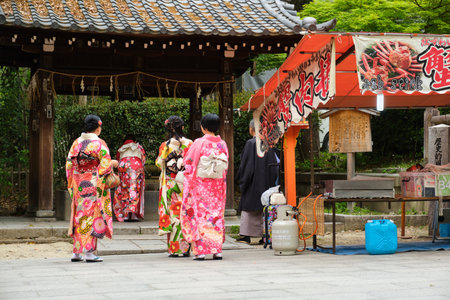 Kyoto, Japan. April 24, 2023: Japanese people in kimono at Yasaka-jinja Shinto Shrine in Kyoto, Japan.のeditorial素材