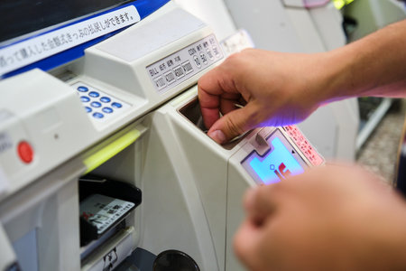 April 30, 2023 in Kyoto, Japan: Traveler buying tickets for Kyoto Municipal Subway train.のeditorial素材