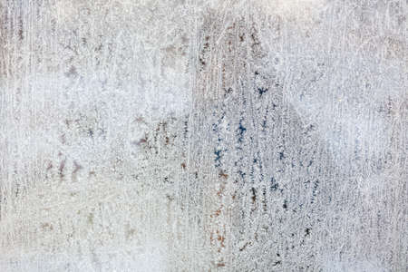 Frost flowers at the window close-up view as a winter wallpaper