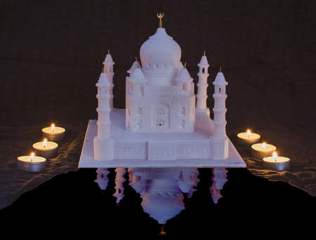 A perspective view on mini Taj-Mahal mausoleum with reflection in waterの写真素材