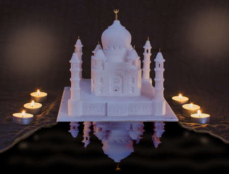 A perspective view on mini Taj-Mahal mausoleum with reflection in waterの写真素材