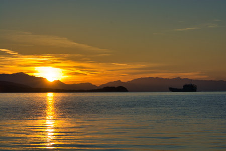 Sunset in a lonely bay in Croatia near Trogir city, Dalmatiaの写真素材