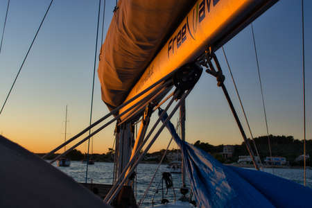 Beautiful colours of Sunset in Dalmatia, Croatia, seen from a boatの写真素材
