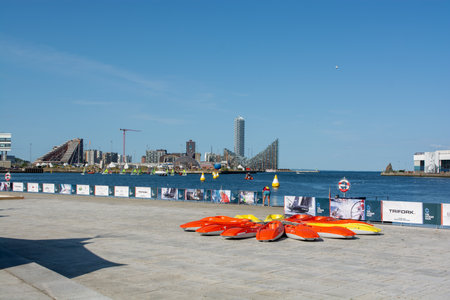 Canoes in front of the Harbor in Aarhus, Denmark in summer 2023 with watersideの写真素材