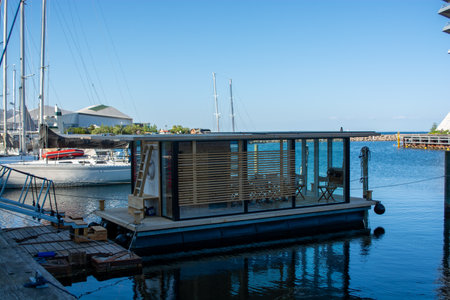 Copenhagen, boats in the harbor with view of the resund in the backgroundの写真素材