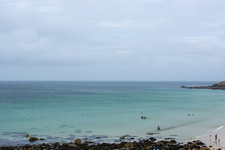 St Ives, Cornwall, UK - August 2023. View of the cliffs and the coast with beach in St. Ives,...