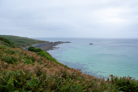 St Ives, Cornwall, UK - August 2023. View of the cliffs and the coast with beach in St. Ives,...