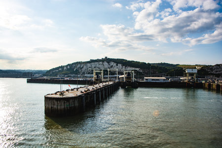 leaving Dover on a ferry, seeing harbor in the backgroundの写真素材