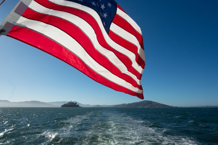 American flag with San Francisco skyline. Space for text. Close-up photoの写真素材