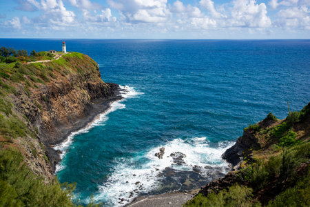 Kilauea point with wildlife refuge above turquoise bay on north coast of Kauai in Hawaiiの写真素材