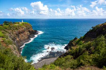 Kilauea point with wildlife refuge above turquoise bay on north coast of Kauai in Hawaiiの写真素材