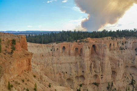 Family hiking in red mountains in Utah on summer vacation. Friends hiking Fairyland Loop Trail. Bryce Canyon National Park, Utah, USA.の写真素材