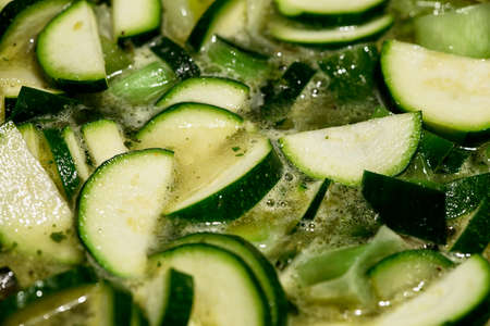 Fresh zucchini and looked boiling soupの写真素材