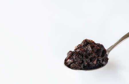 Caramelized red onions on a spoonの写真素材