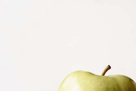 Green apple, shiny refreshing on white backgroundの写真素材