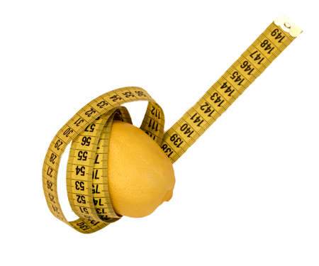 lemon with a tape measure on an isolated white background.の写真素材