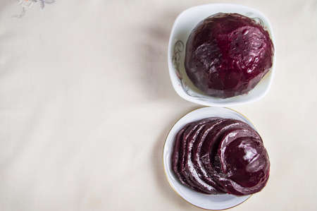 sliced boiled beetroot on a white plate. Concept of healthy nutrition. Top view